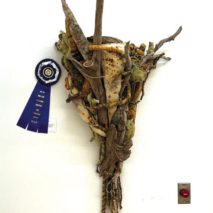Stephanie Shroyer’s fiber and found materials sculpture titled “Tornado.”