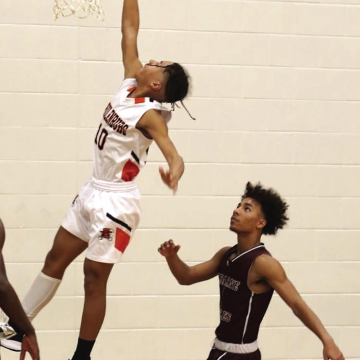 Schulenburg’s Byron Johnson drives for a lay-up in Monday’s playoff game. Photos by Audrey Kristynik