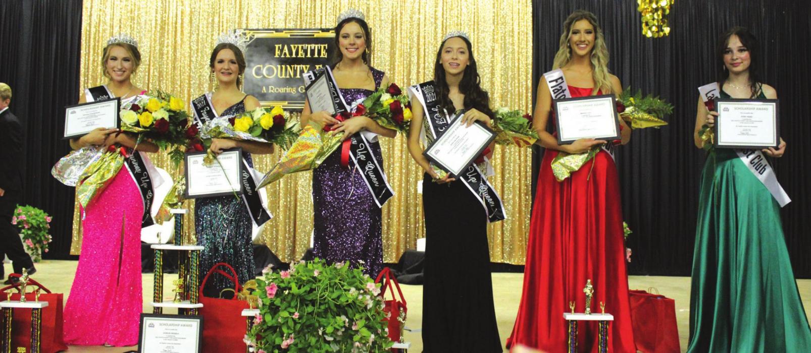 Left to right at the Queens Contest: First runner-up Brynna Stackhouse, 2021 Queen Charlee Wessels, Second runner-up Kayler Burnett, Third runner-up Rory Halpain, Braidy Fike and Avery Ward. Photo by Jeff Wick