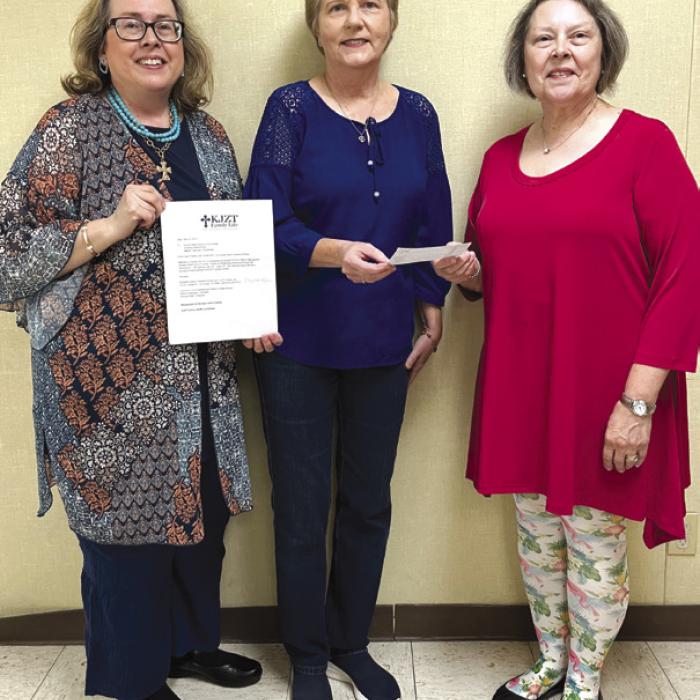 KJZT Family Life, Society No. 31 of La Grange, St. Frances of Rome, recently made a $150.00 donation to help sponsor t-shirts for Vacation Bible School to be held at Sacred Heart Church for ages Pre-K to 5th grade. The June 12-15 VBS theme is “Wilderness Adventure through the Sacraments”. From left, President Elizabeth Kallus, VBS Coordinator Marian Tajchman, and Secretary Marilyn Kothmann.