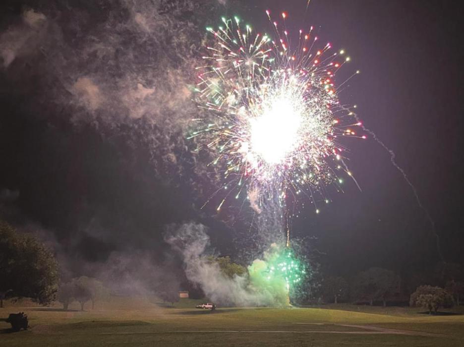 After a rain shower Saturday afternoon, it was a beautiful evening July 3 at Frisch Auf’s community celebration in La Grange. Here fireworks light up the sky over the golf course. Photo by Jeff Wick