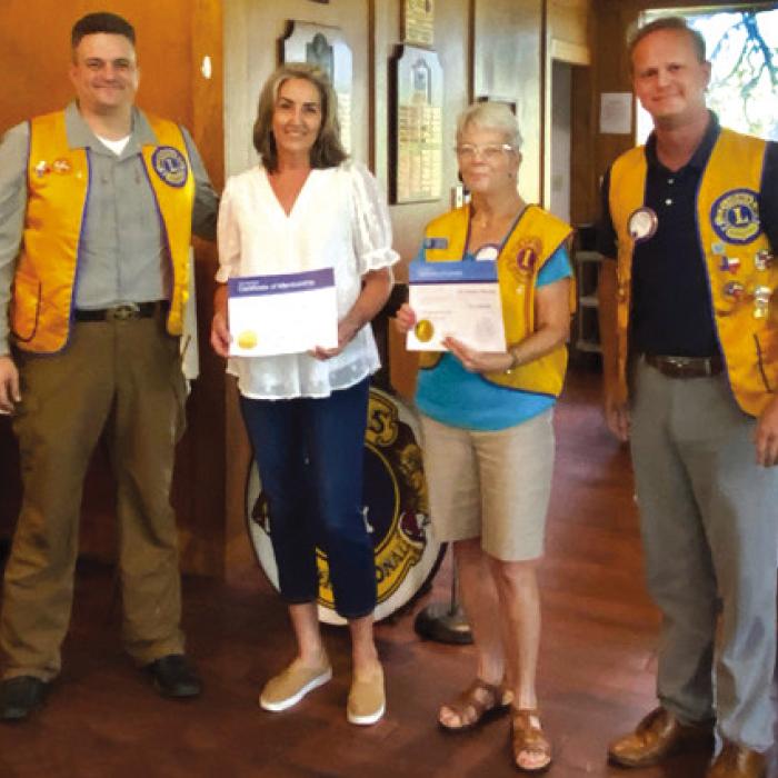 Pictured with Lion President Craig Moreau, Lion Lisa Adamcik, her sponsor Lion Adrienne Armstrong and Induction Officer Lion David Wagner.