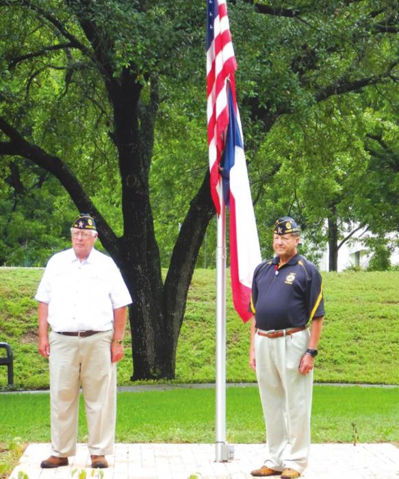 A Memorial Day service was held at the Carmine Muehlbrad-Albers City Park on May 25. Pictured are Lyn Reavis and Bruce Bockhorn with the Quade-Werchan American Legion Post 338. Jennifer Mohr played Taps and Susan Bathe read the names of the deceased veterans. A small group was in attendance.