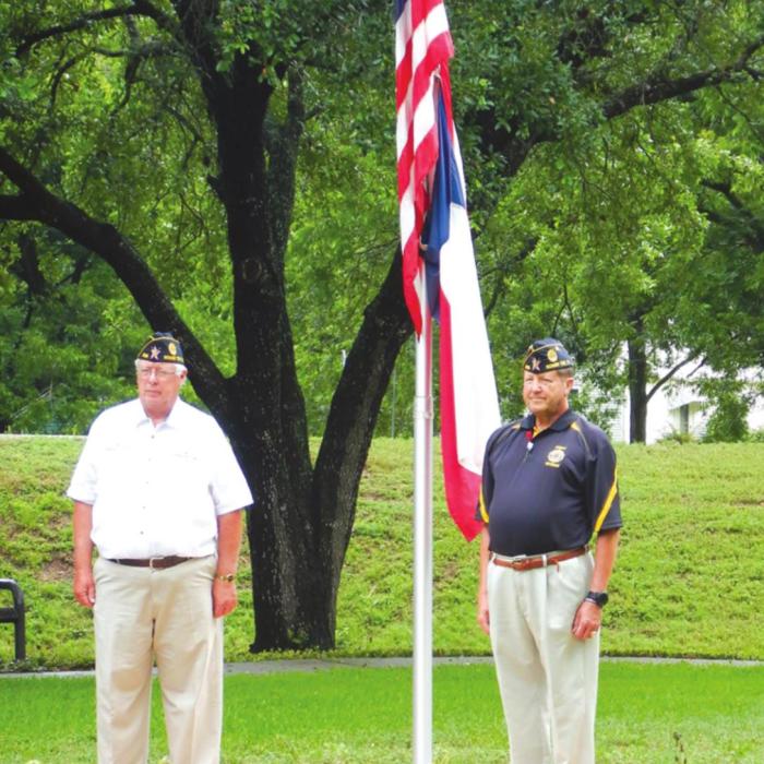 A Memorial Day service was held at the Carmine Muehlbrad-Albers City Park on May 25. Pictured are Lyn Reavis and Bruce Bockhorn with the Quade-Werchan American Legion Post 338. Jennifer Mohr played Taps and Susan Bathe read the names of the deceased veterans. A small group was in attendance.