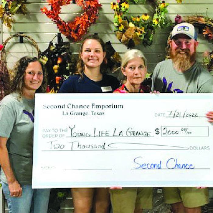 Second Chance Emporium recently donated $2,000 to Young Life of La Grange. Young Life’s mission is to introduce adolescents to religion and help them grow in their faith. Pictured from left to right: Kevin Ulrich, Young Life committee member; Laurie Krupala, Young Life donor chair; Julia Thomas, Second Chance Emporium asst. store director; Gayle Schielack, Second Chance Emporium store director; Tim Scarborough, Young Life Committee chair and Annette Cooper, Young Life committee member.