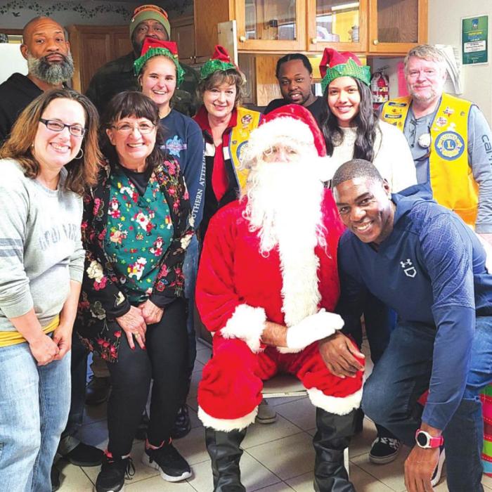 Clubs Deliver Gifts to Whispering Hills Center