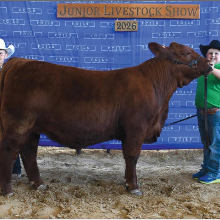 Reserve Champion Heifer - Stockton Emshoff, Fayetteville 4-H; Reserve Champion Buckle Sponsor - In Memory of Frankie Joe Cernosek. McCrae Walden and Bowen Bishop pictured holding banner and Nettie Cernosek holding buckle.