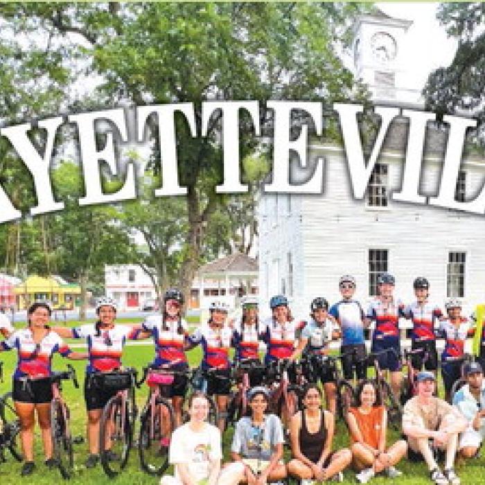 The Texas 4000 Ozark Team gathered on Fayetteville’s courthouse lawn before getting back on their journey.