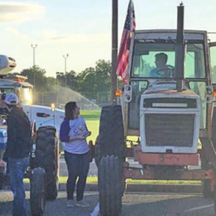 Four at LHS Drive Their Tractors to School