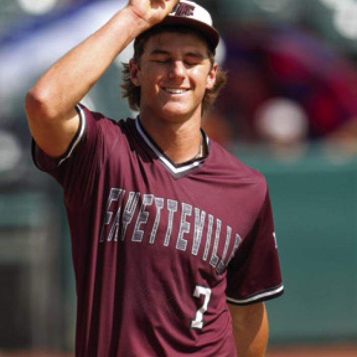 Jack Schley points skyward after a key out in the title game. Photo by Scott Coleman