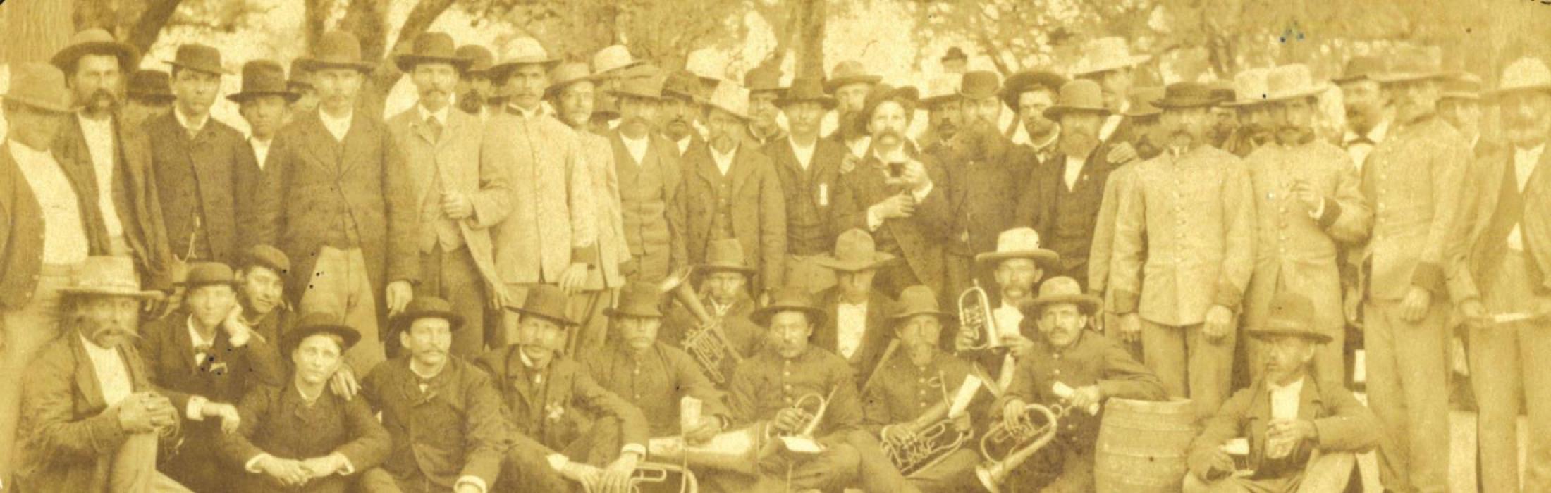 Members of the Bluff Schuetzenverein, a German Texas shooting club and social organization, pose for a photo at one of their many events in the late 1870s or early 1880s.