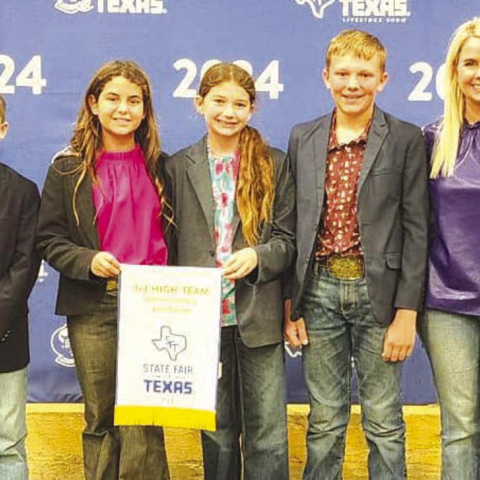 3rd Place Junior Livestock Judging Team: Crockett Guenther, Adalyn Carrales, Laramie Laake, Holden Holub, and Coach Kaci Carrales.