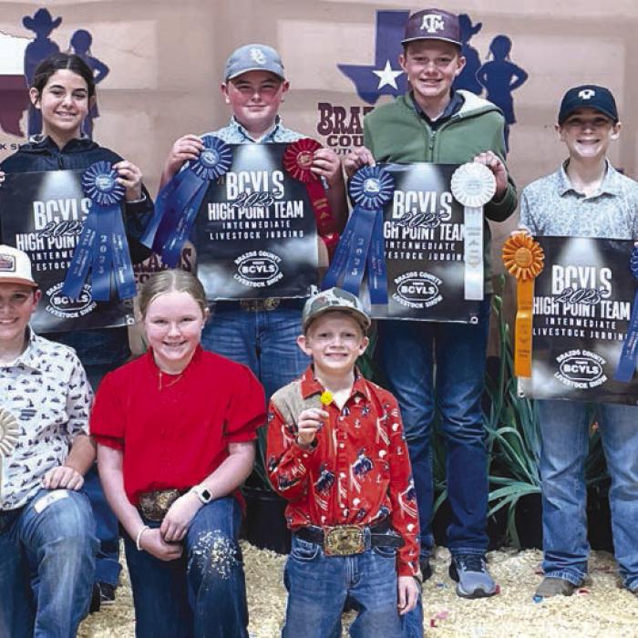 Front row: Hudson Holub, Abigale McBride, and Joe Carrales Back Row: Coach JoJo Carrales, Adalyn Carrales, Abraham McBride, Holden Holub, Crockett Guenther, and Coach Kaci Carrales.