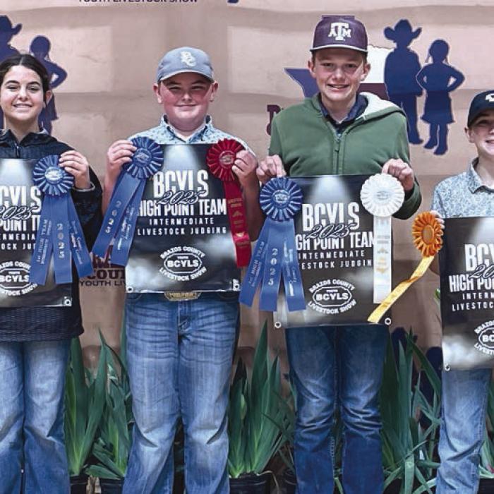 Champion Intermediate Team: Adalyn Carrales, Abraham McBride, Holden Holub, and Crockett Guenther.