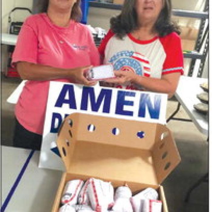 AMEN received donation from CattleWomen, pictured are left Cassie Girard, President, AMEN, and right, Robbie Cole, NVCW.