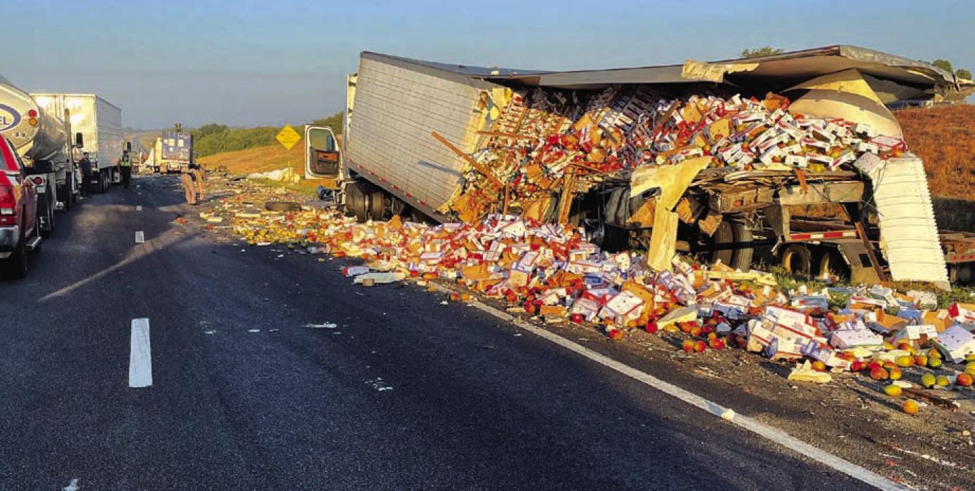 Mangos are strewn about on I-10 and one 18-wheeler struck another carrying the produce Friday. One person was ejected and killed because of the collision.