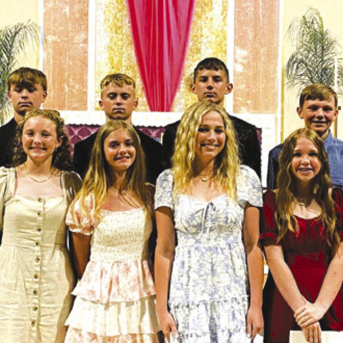 Pictured front, from left: Principal Rosanne Gallia, Courtney Magliolo, Caroline Bartek, Mallory Bonner, Saybra Pinney, Reese Dusek, Tenley Zbranek, Rev. Luke Prihoda; back row: Pastor Jasper Liggio, Bo Brossmann, Brett Hollas, Weston Hollas, William Eudy, Holden Holub, Rilee Durfey and Teacher Matt Bonner.