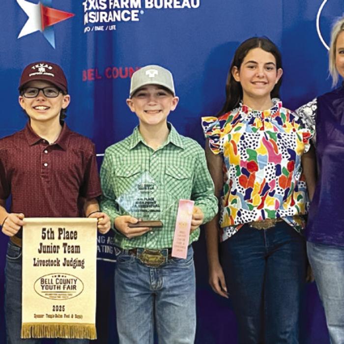 5th Place Junior Team: Dylan Zweschper, Tate Fritsch, Crockett Guenther, Adalyn Carrales and Coach Kaci Carrales.