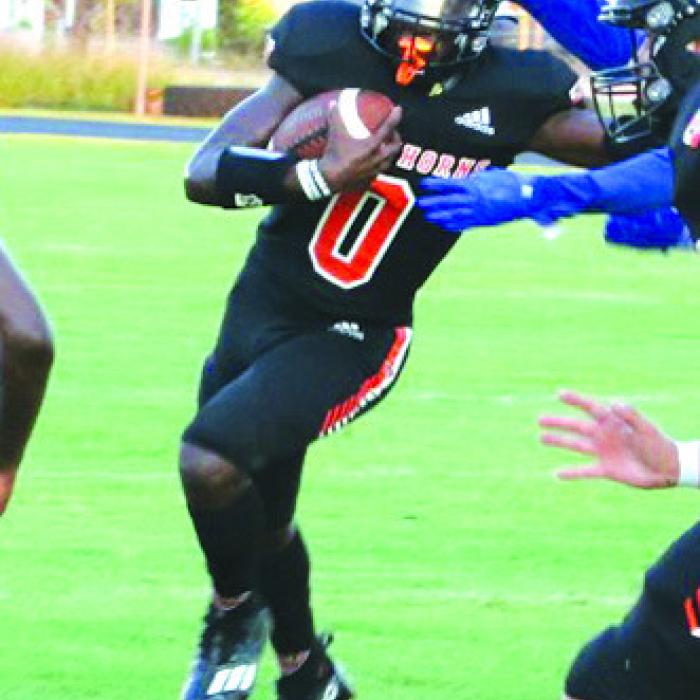 Schulenburg’s Rodney Walton runs the ball in last Friday’s game at Randolph. Photo by Audrey Kristynik
