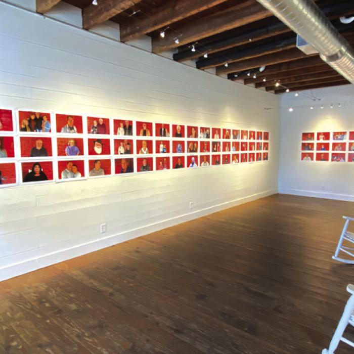 Red Wall Portraits hanging in the Red &amp; White Gallery.