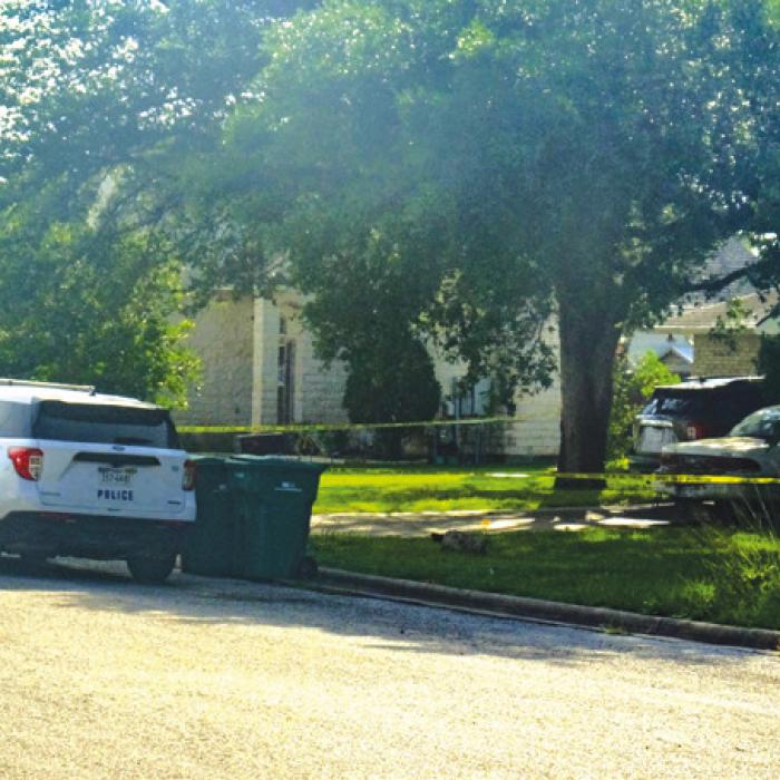 Crime scene tape surrounded a house on Northpointe Ave. while a La Grange Police Officer guarded the perimeter Saturday morning, June 14.