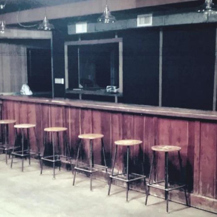 A long bar at Quezeen.