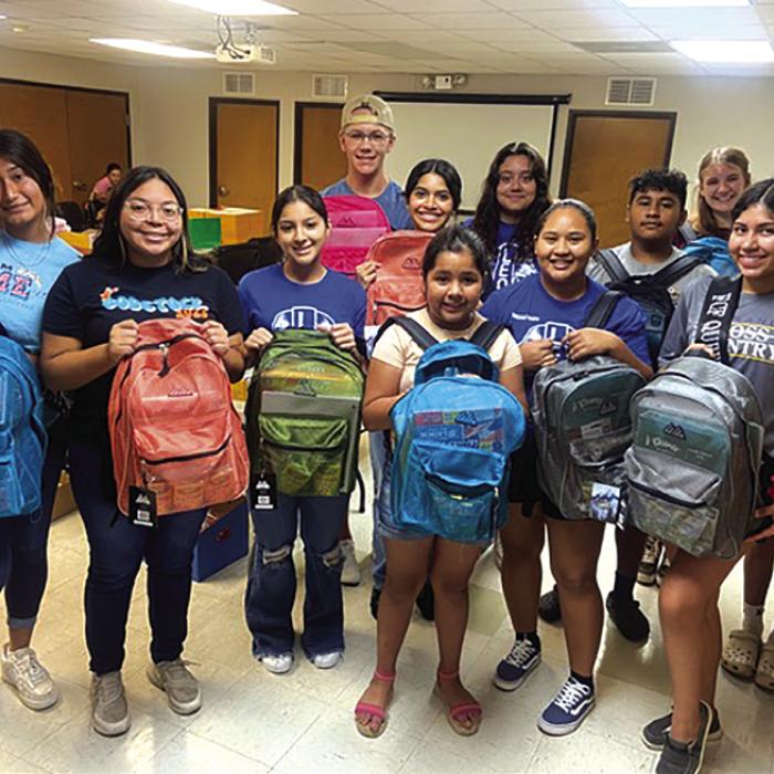 Leo Club Fills Backpacks for Back 2 School Fest