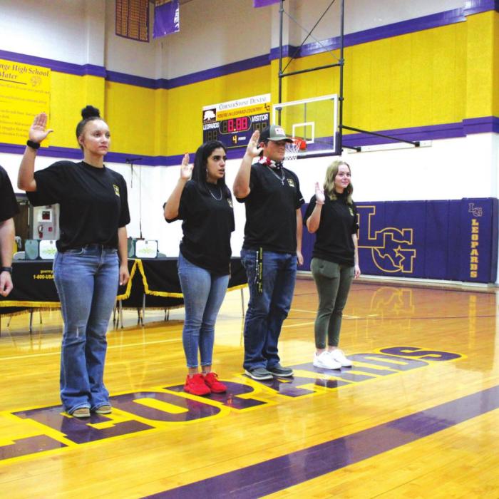 Left to right, La Grange high school seniors Caleb Burton, Kailee Jones, Courtney Pacheco, Kaleb Pyle and Abigail Sparks take their Oath of Enlistment in the US Army Wednesday. Photos by Jeff Wick