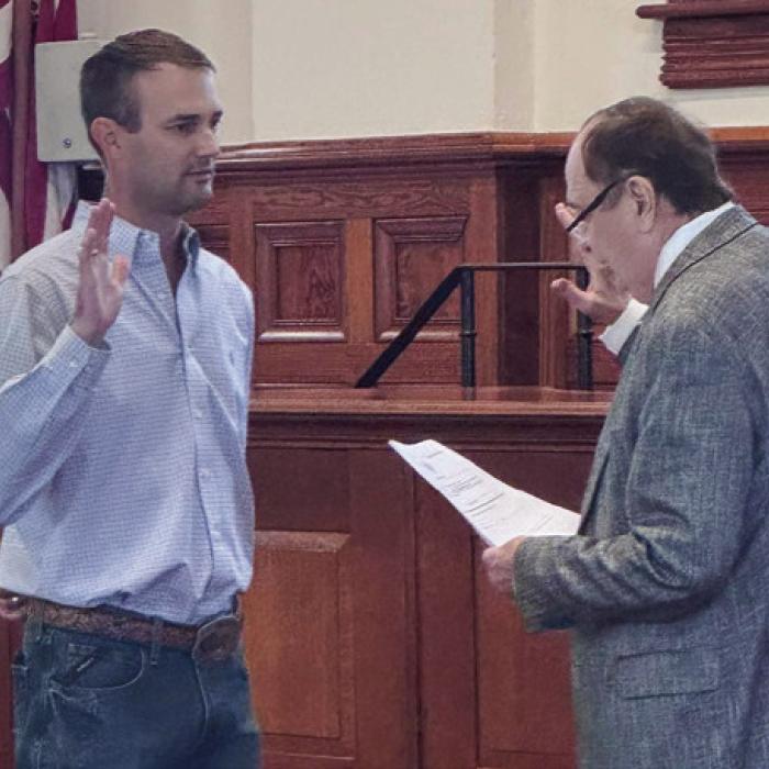County Judge Dan Mueller (right) delivered the oath of office to the newly-appointed Pct. 2 Commissioner, Clint Sternadel, on Friday morning, May 2. Mueller appointed Clint Sternadel to replace his father Luke Sternadel, who retired from the County at the end of April.