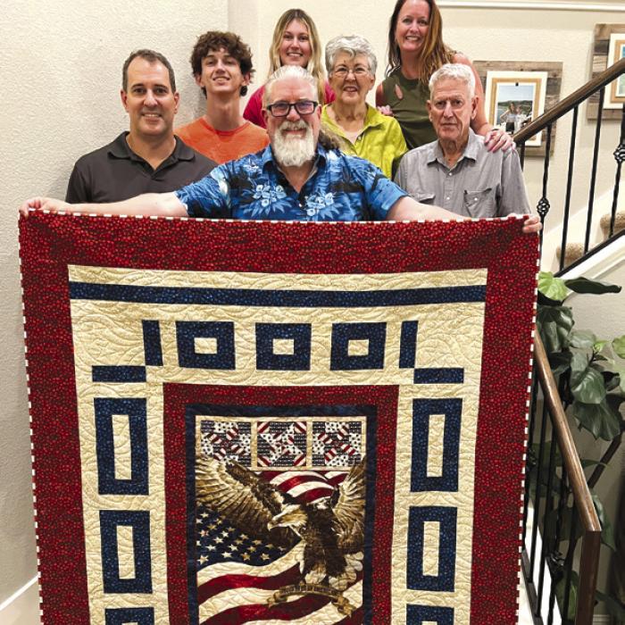 The Colorado Valley Quilt Guild presented a Quilt of Valor to James Hill of Abilene. He is a graduate of La Grange ISD. James served in the 3rd Armored Division, HHC 38th Cav in Germany. They were dispatched to Desert Shield Desert Storm. Afterwards he served at Fort Lewis, Tacoma, Washington. James is the son of Orvel and Jo Anne Hill of La Grange. Brother, Brent Hill and family also celebrated with James in receiving the Quilt of Valor.