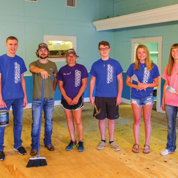 A group of senior Fayetteville High School students in the school’s work-study made some good memories working at Orsak’s Cafe in Fayetteville while school has been out for the coronavirus. Part of their work involved remodeling one of the restaurant’s dining rooms. Pictured (from left) are Dustin Canik, Gage Briggs, restaurant owner Terri McPherson, Braden Kubala, Sydney Knight and Amber Canik. Photo by Andy Behlen