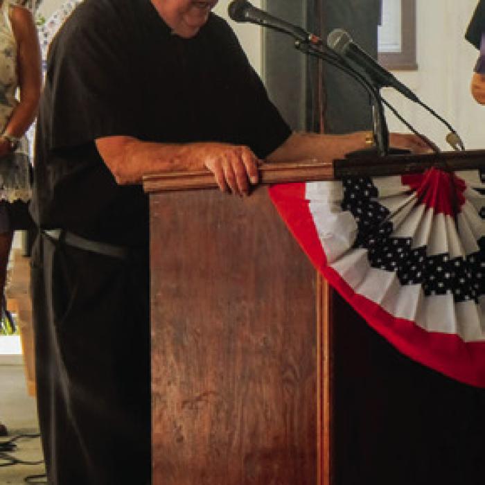 Mgsr. John Peters led a prayer of thanksgiving before the meal.