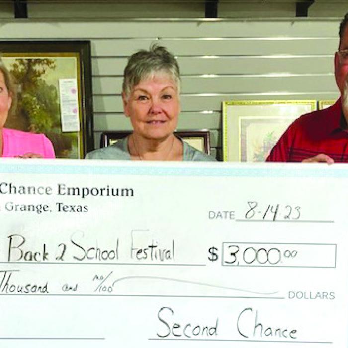 Second Chance Emporium (SCE) recently donated $3,000 to be a sponsor of the Tejas Health Care Back 2 School Festival. Monies donated provided 75 backpacks, prefilled with school supplies, for students in need to be successful in the classroom. Pictured from left to right: Gayle Schielack, SCE Store Director; Darlene Strahan, SCE Assistant Store Director; and Gene Carson, Tejas Health Care Chief Financial Officer.