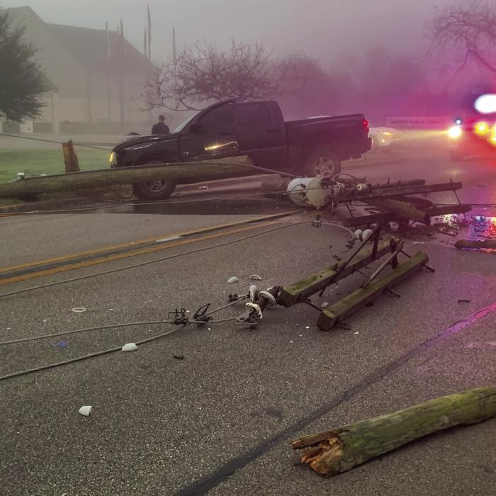 A pickup truck struck a power pole in front of Fayette Public Library in La Grange Tuesday morning, Jan. 17. The driver reported losing control after his front wheel bearings failed. Photo courtesy of the La Grange Volunteer FIre Department