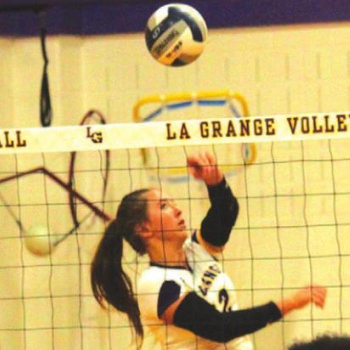 Maddi Fritz tips a ball in Friday’s match.