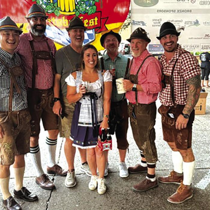 Downtown La Grange was filled with the sights, sounds, smells and tastes of Europe as The Rotary Club of La Grange hosted their Oktoberfest on the Square Saturday. Attendees were able to sample more than 60 varieties of craft beer under a pair of tents, listen to live bands, and feast on schnitzel, sausage and German noodles to complete an authentic Oktoberfest experience. Some attendees really got into the spirit of the event by dressing the part, above. Photo courtesy of Jonathan Hernandez