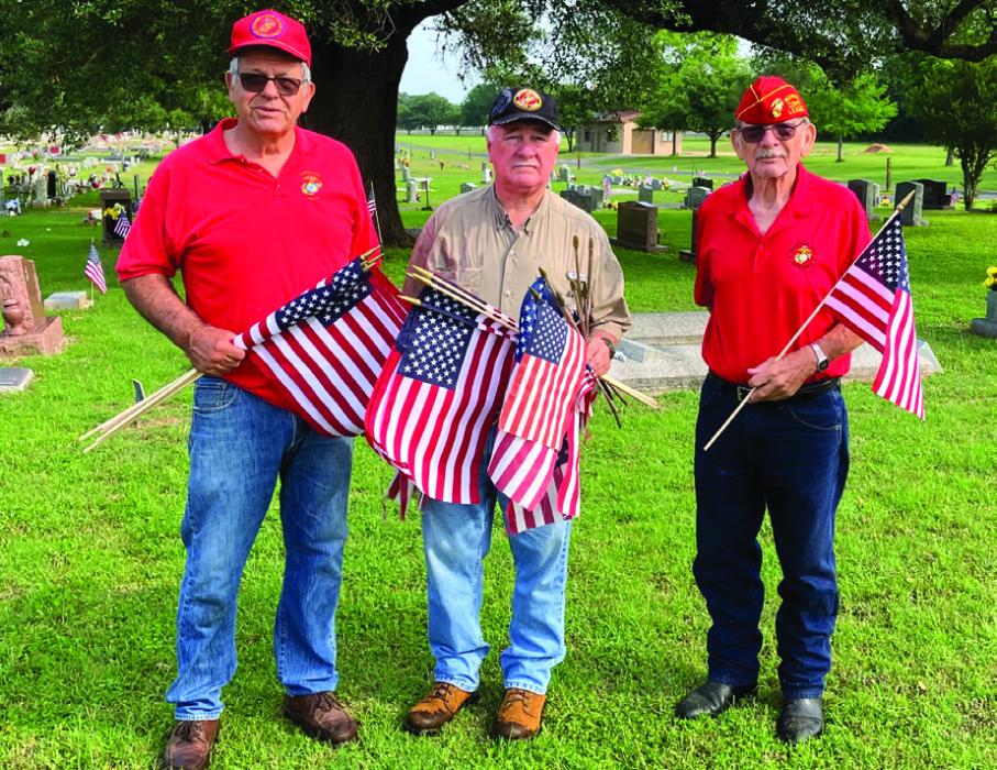 In advance of Memorial Day (Monday, May 29) members of the Colorado Valley Marine Corps League put flags on the graves of soldiers at numerous local cemeteries. Left to right: John Kana, Richard Chance and Doug Blaha. Photo by Bobby Bedient