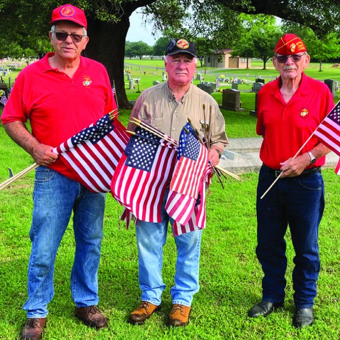 In advance of Memorial Day (Monday, May 29) members of the Colorado Valley Marine Corps League put flags on the graves of soldiers at numerous local cemeteries. Left to right: John Kana, Richard Chance and Doug Blaha. Photo by Bobby Bedient