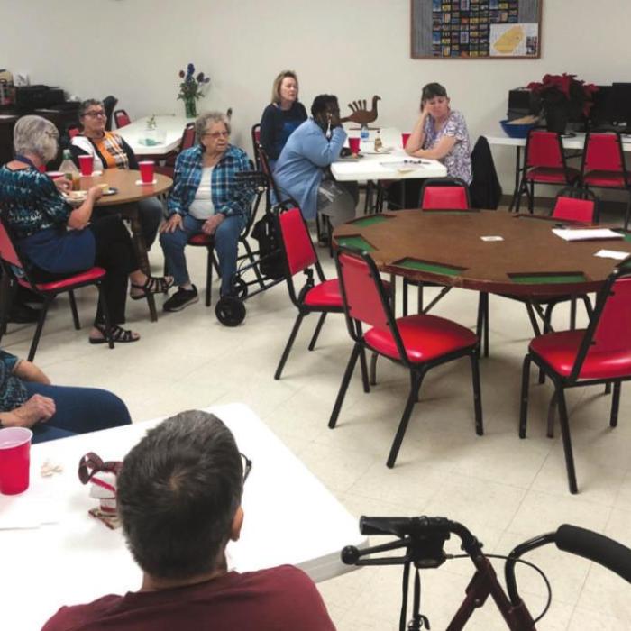 NVCC members hear from Summit House owner Elizabeth Olsen.