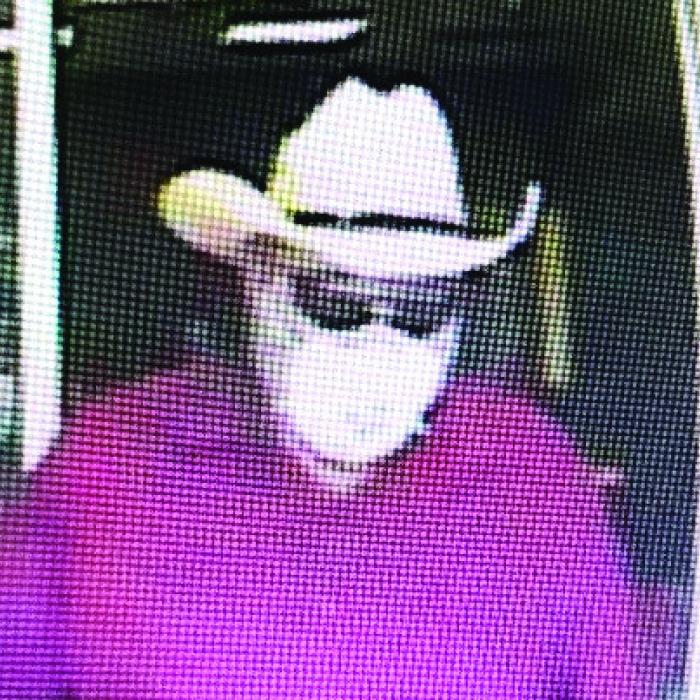 Surveillance video captured this image of the Burton bank robber on June 7, 2018.