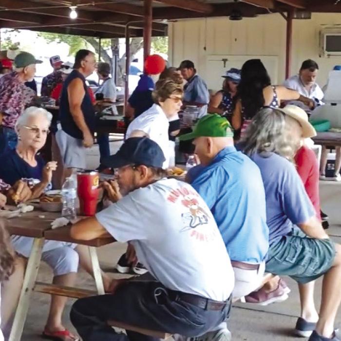 Community members filled the Muldoon Community Park after the parade, enjoying an afternoon of visiting, games, and fundraising activities during the town’s celebration of the nation’s 250th birthday.