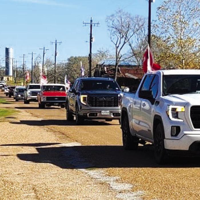 A “Trump Train” celebrating President Donald Trump’s upcoming inauguration came through Ellinger on Saturday, Jan. 11. Shown here is the line of cars that came down Grover Street as the train made it’s way across the county.