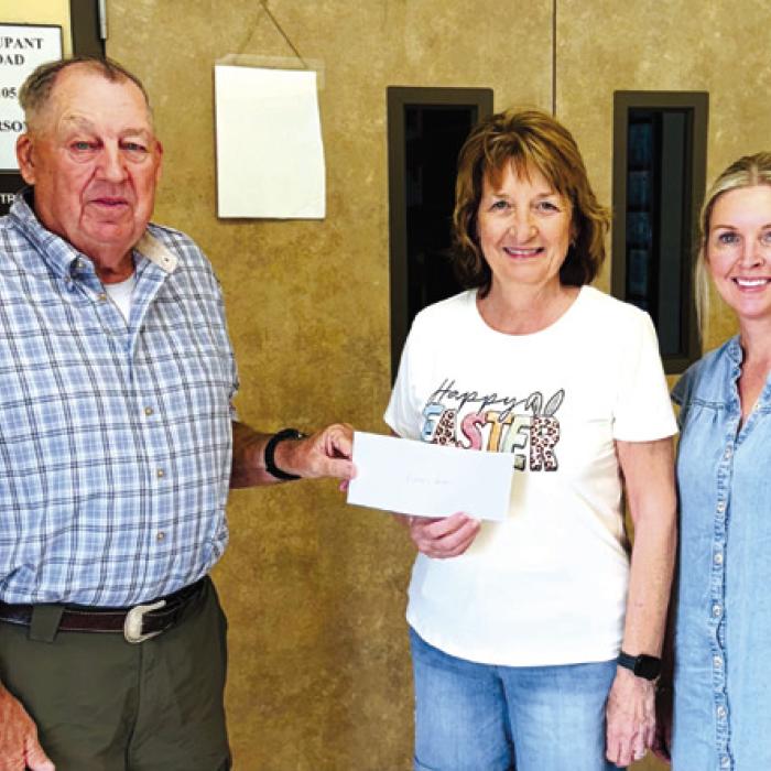 Presley’s Power recently accepted a donation from Hermann Sons Life-Plum. Pictured are Wilbert Hoffmann, Jackie Wessels, and Marlana Wessels.
