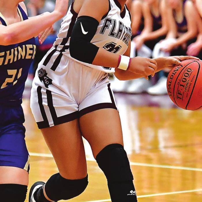 Flatonia senior Y’Lila Willis dribbles down court for Flatonia in Friday’s win over Shiner. Photo by Stephanie Steinhauser