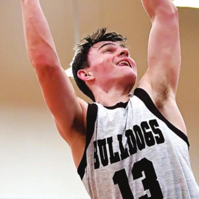 Flatonia’s Luke Law goes up for two for the Flatonia Bulldogs in Tuesday’s game against Snook. Photo by Stephanie Steinhauser