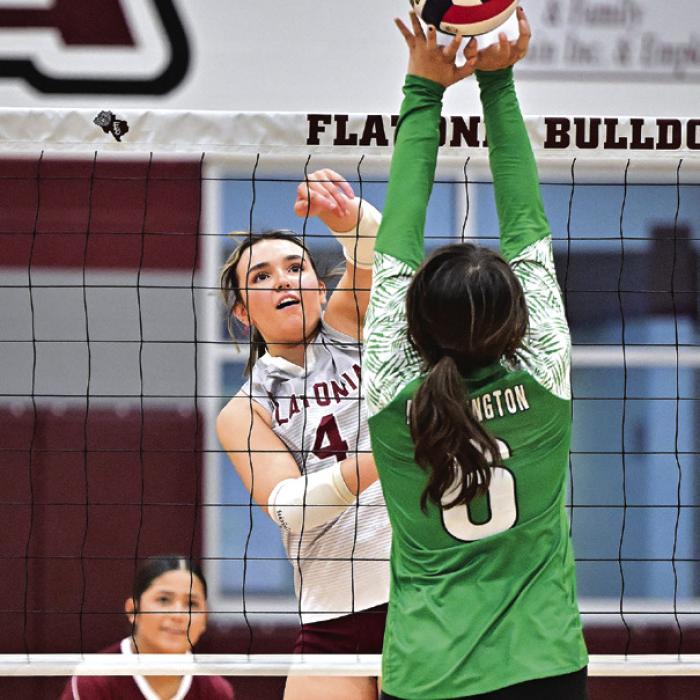 Flatonia Senior Kat Sullivan gets a hit past Bloomington. Flatonia defeated Bloomington in three sets on Friday. Photo by Stephanie Steinhauser
