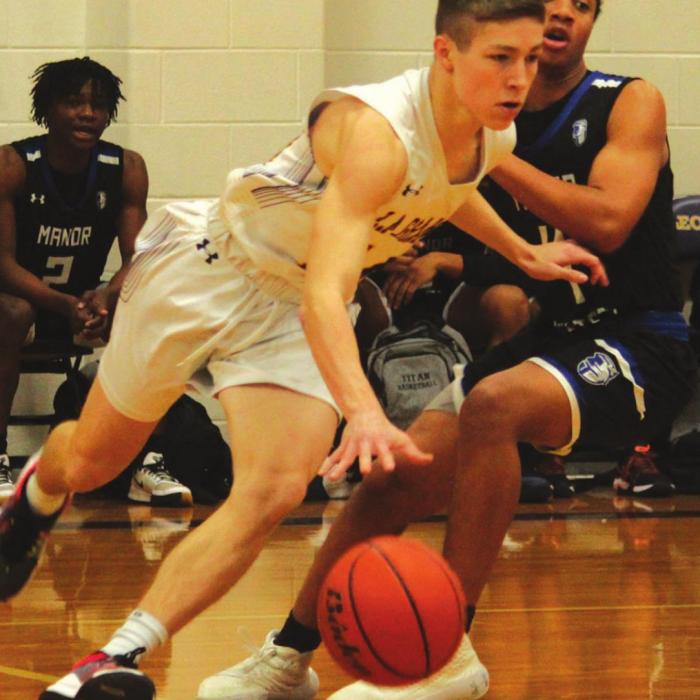 La Grange’s Clayton Knapik drives past a Manor New Tech defender in Friday’s game. Photo by Jeff Wick