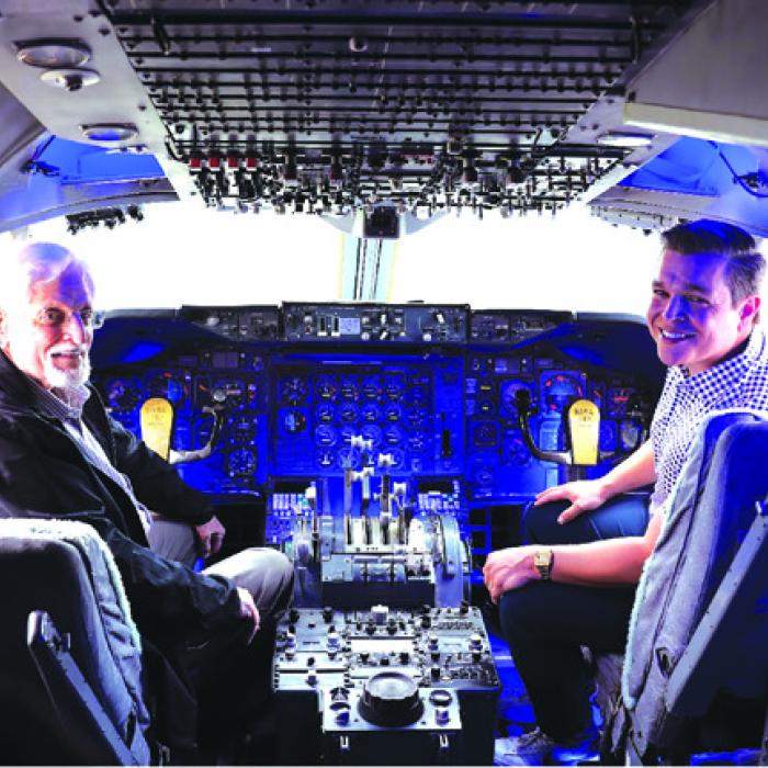 Harold “Hal” Stall and his grandson Micah Manzano at the controls of NASA’s Shuttle Carrier Aircraft (Boeing 747) on static display at Space Center Houston, NASA Johnson Space Center, Houston, Texas.