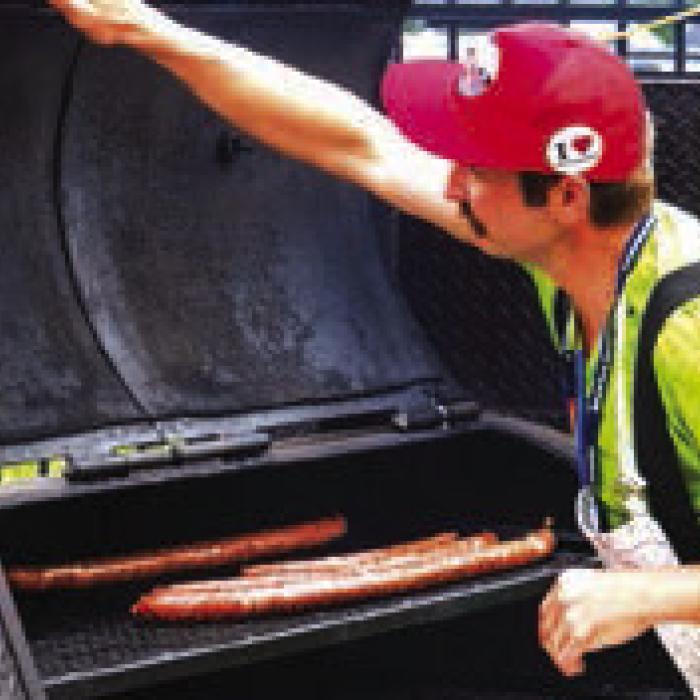 Some extra-long links heat up on the grill at Sausagefest.
