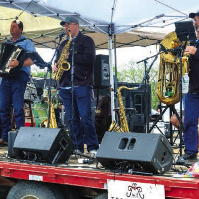 The Czechaholics performed on the stage downtown.
